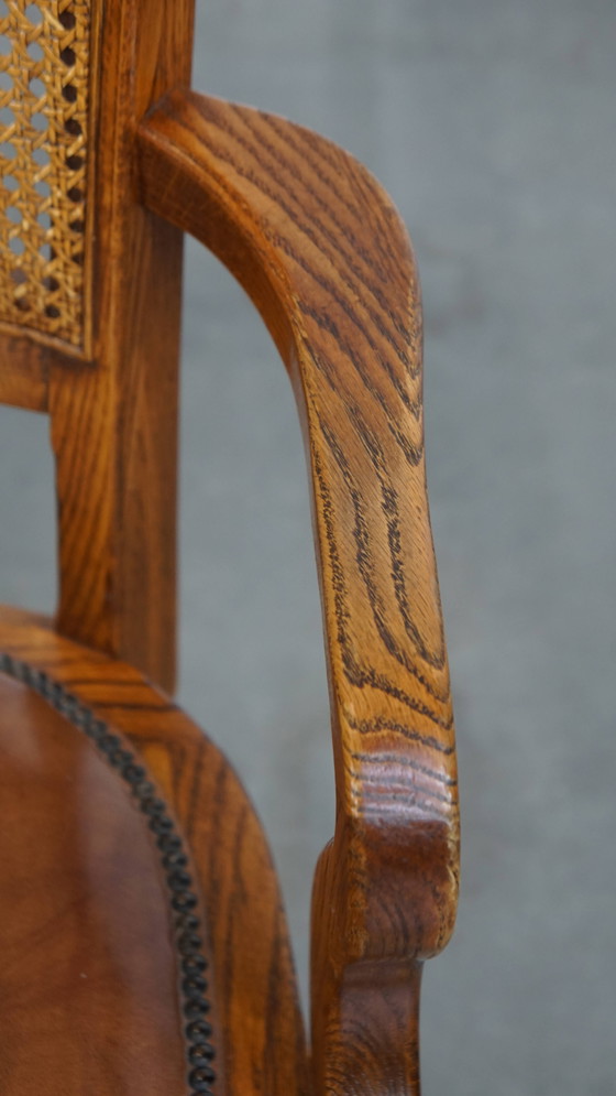 Image 1 of Cognac Colored Leather Office Chair on Wheels with Wood and a Wicker Matted Backrest