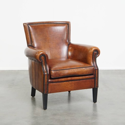 Fauteuil en peau de mouton à la finition luxueuse