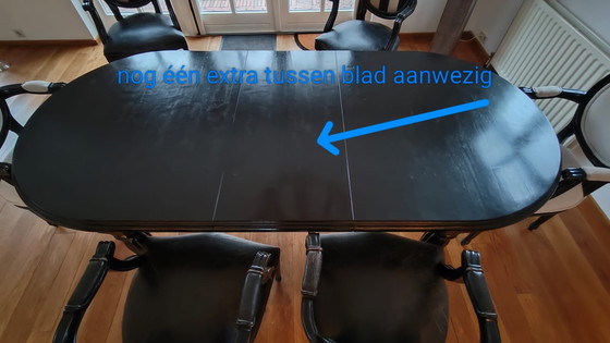 Image 1 of Table de salle à manger ovale noire avec 6 chaises