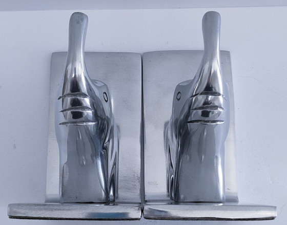 Image 1 of een paar boekensteunen in de vorm van olifanten, gegoten aluminium