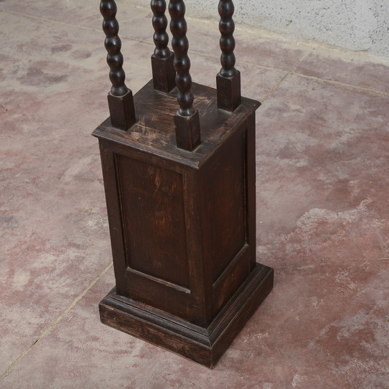 Porta piante da ingresso in legno scuro tornito (photo 10 of 15)