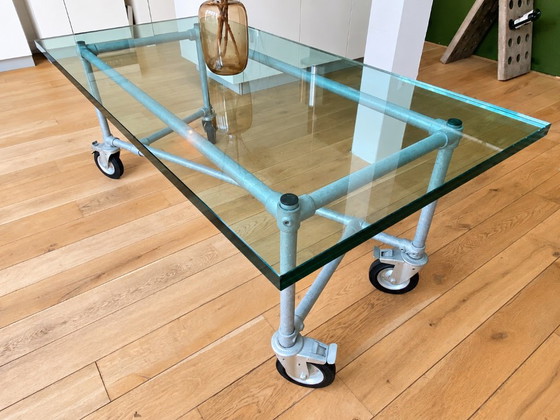 Industrial table with glass top and metal base on wheels, Eigen ontwerp, Dining tables, Transparent (photo 3 of 5)