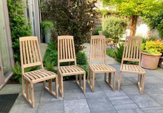 Image 1 of 4 elegante Gloster teakhouten tuinstoelen, zware kwaliteit teak