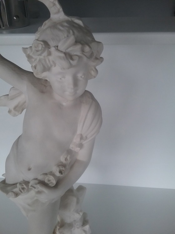 Image 1 of Jongen met bloemen 