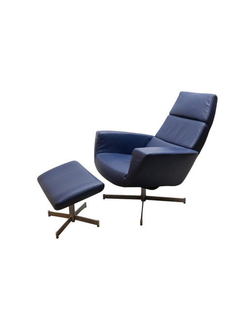 Fauteuil en cuir avec ottoman