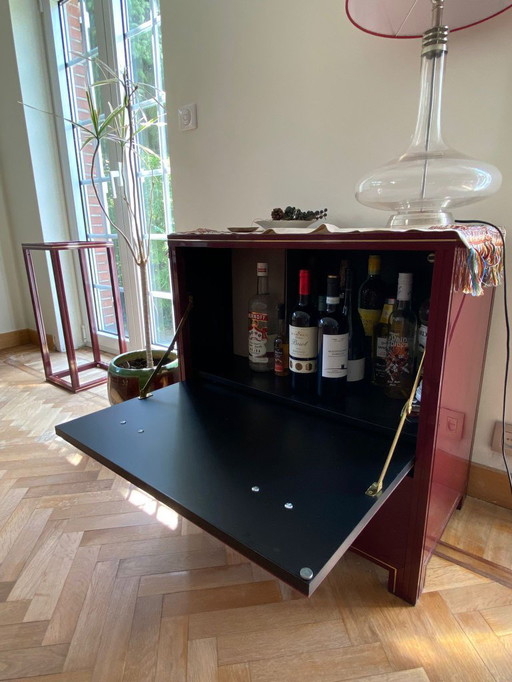 Design furniture set by Pierre Vandel, in burgundy lacquered wood with brass inlays