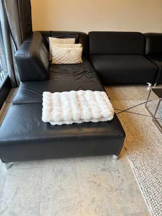 Image 1 of Leolux Faya Lobi corner sofa with loose footstool - black leather and fabric loose element piece