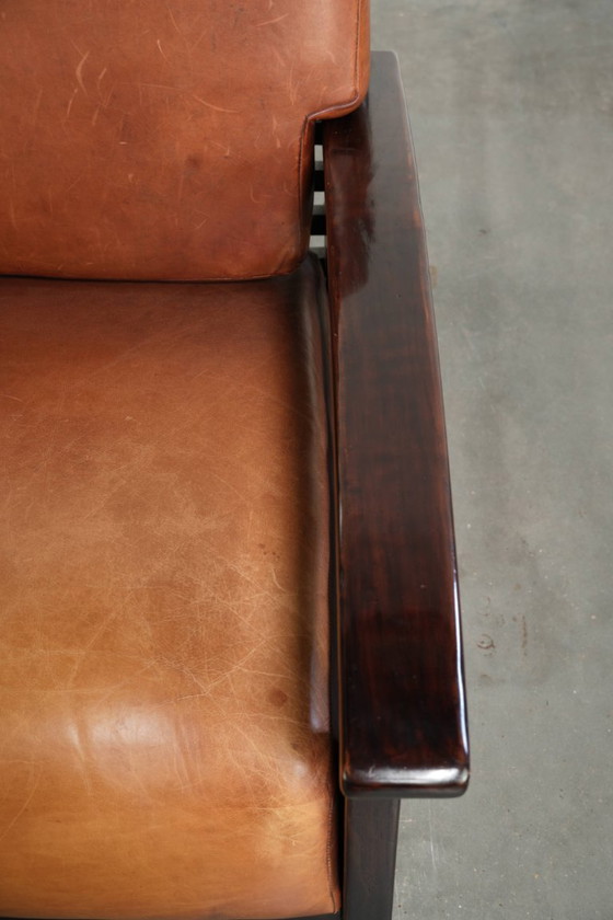 Elegant cowhide armchair with beautiful details in timeless Art Deco design – Leather, Klassiek (photo 8 of 12)