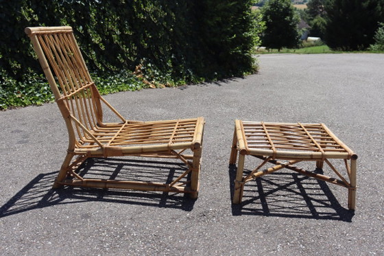 Image 1 of Poltrona e poggiapiedi in rattan di Audoux & Minet, 1950
