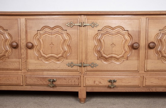 Image 1 of Very large French sideboard in solid oak by Guillerme and Chambron for Your Home 1960.