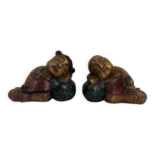 Serre-livres en bois sculpté
