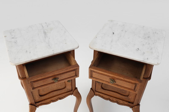 Image 1 of Pair of French Louis XV Style Nightstands in Oak with Carrara Marble Top