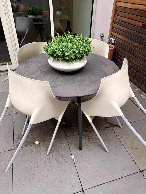 Image 1 of Garden set with 4 Kartell Dr. NO garden chairs