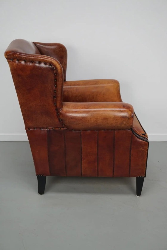 Image 1 of Vintage Nederlandse clubfauteuil in cognackleurig leer