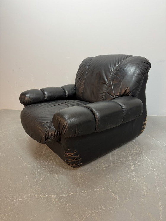 Image 1 of Beautiful Big Black Leather Postmodern Italian Design Space Age Lounge Chair with Brass Buttons and Playful Cord Lacing, 1970s.