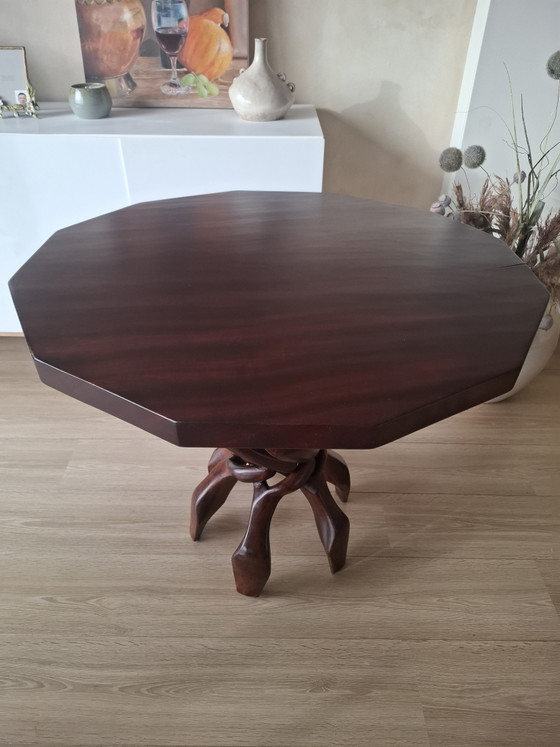 Image 1 of Interlocking African "unity" table.