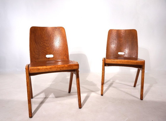 Image 1 of Set di due sedie da pranzo impilabili in compensato, 1960