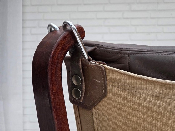 Image 1 of Jaren 70, Noors ontwerp van Sigurd Ressel, loungestoel met voetenbank, model "Falcon".