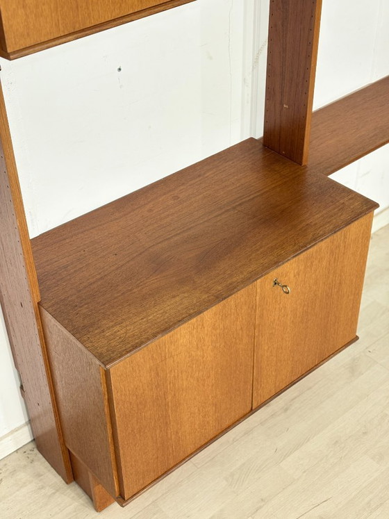 Modular mid-century wall shelf by interna-Peter Pedrides / Teak shelving system 1960s – Shelving unit, Wood (photo 18 of 27)