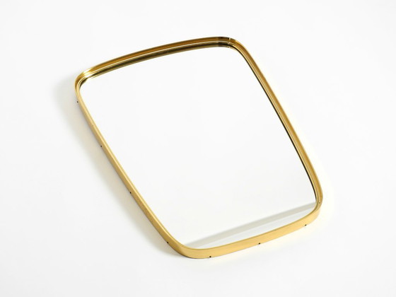 Image 1 of A pair of rare original Mid Century Modern "Münchener Zierspiegel" wall mirrors with heavy brass frames