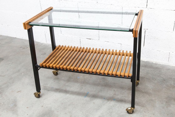 Image 1 of Serveerwagen uit de jaren 60, hifi-kast op wieltjes in teakhout, zwart metaal en glazen blad.