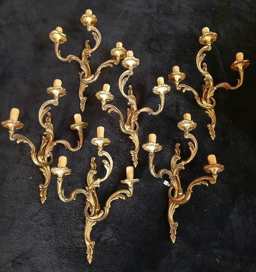 Large set of Louis XV rocaille style bronze wall sconces