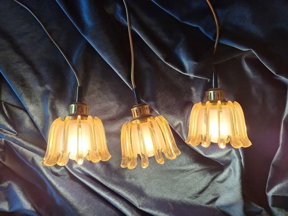 Image 1 of Set van 3 Doria hanglampen van messing en amberkleurig matglas, jaren 60