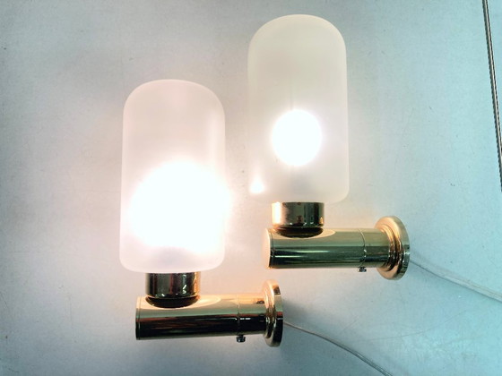 Image 1 of Dos apliques de pared de Keuco, fabricados en metal chapado en oro y cristal.