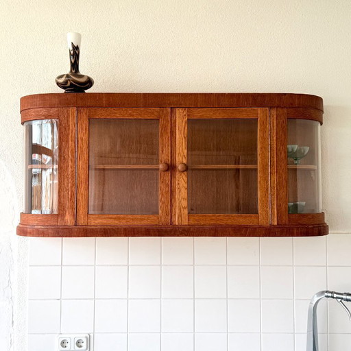Elegant hanging display cabinet in Art Deco style