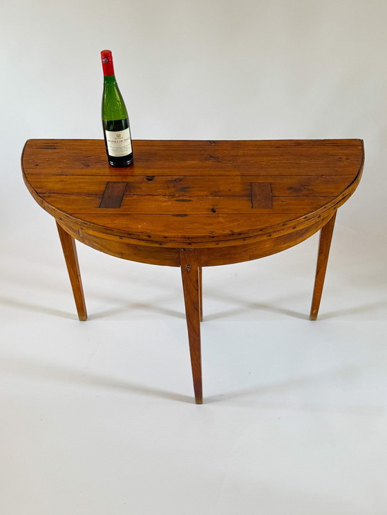 Image 1 of Table demi-lune en pin du XIXe siècle