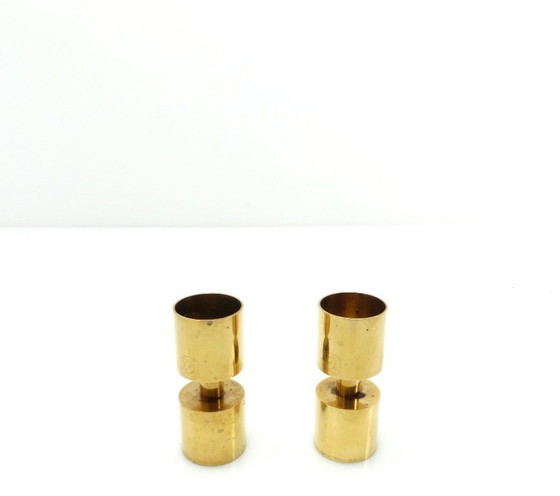 Image 1 of Een paar Zoégas Kaffe kandelaars van massief messing, Zweden 1976.