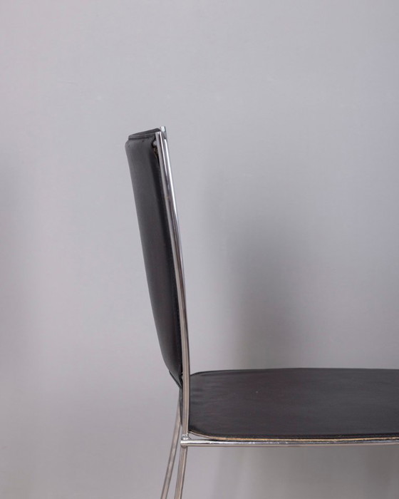 Image 1 of Een paar vintage leren stoelen uit de jaren 90, ontworpen door Segis Italia.