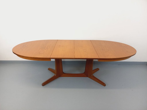 Vintage Baumann oval teak dining table from the 1960s/70s with extensions