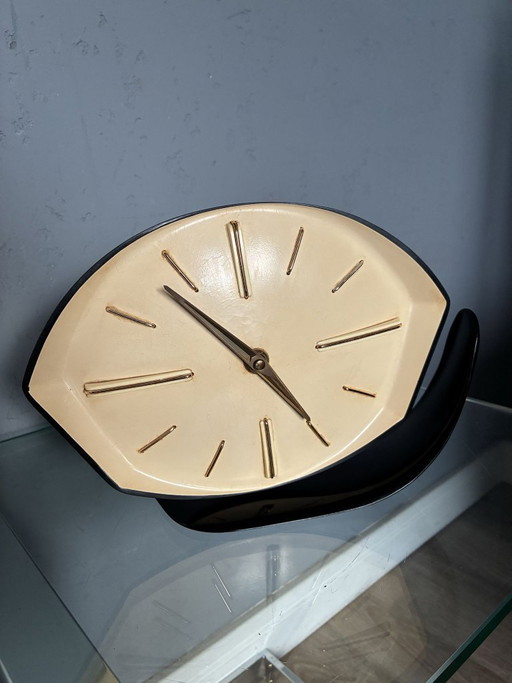 Reloj de sobremesa Prim de baquelita, reloj ojo de gato checoslovaco de los años 50