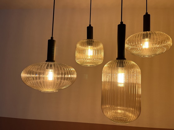Image 1 of Plafondlamp met 7 glazen lampenkappen