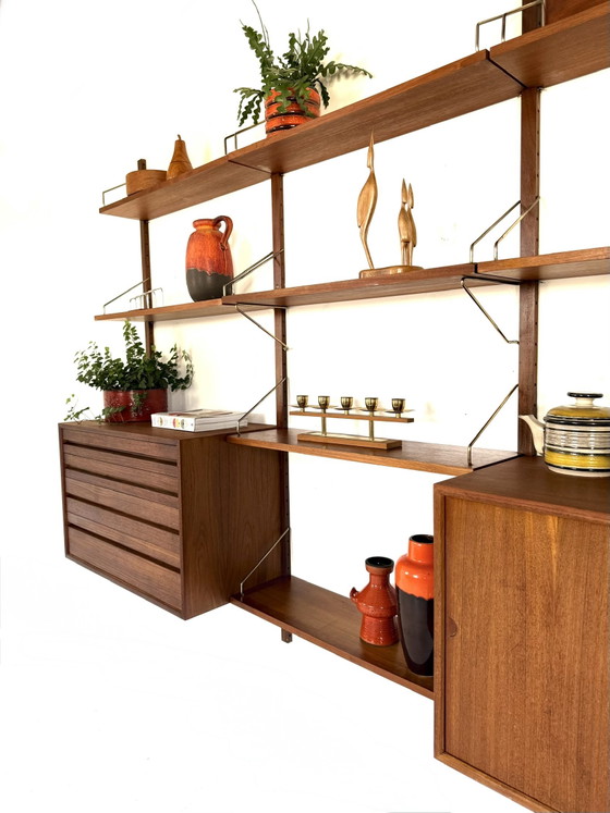 Vintage modulair teakhouten wandsysteem, Poul Cadovius ‘60 – Wandkast, Wood, Brass (photo 9 of 15)