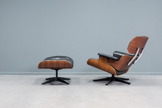 Image 1 of Fauteuil lounge Eames et repose-pieds
