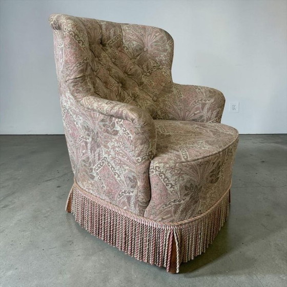 Image 1 of Fauteuil vintage rose clair à motifs floraux / une place avec franges