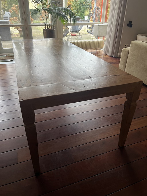 Teak dining table