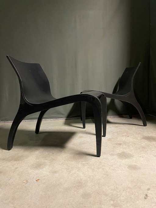 Paar sculpturale multiplex lounge stoelen