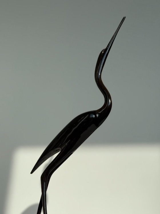 Image 1 of Héron vintage sculpté à la main