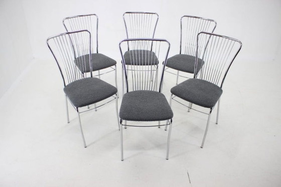 Image 1 of Set van zes Italiaanse eetkamerstoelen van chroom en bouclé, jaren 70.