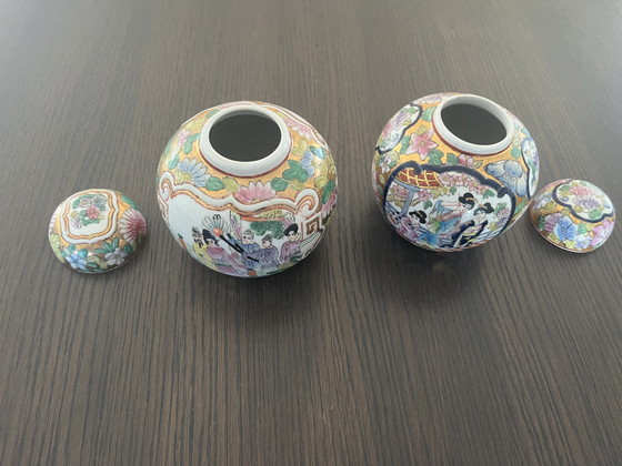 Image 1 of Set of 2 Japanese hand-painted Kutani ginger jars with lids and wooden feet