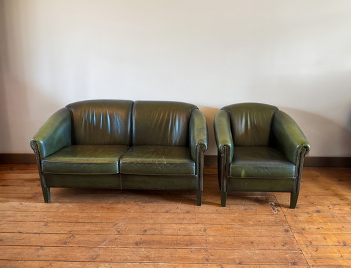 Chesterfield green leather seating area