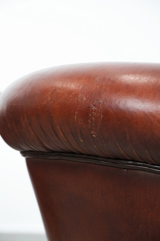 Image 1 of 2 x Vintage schapenleren clubfauteuil met siernagels 