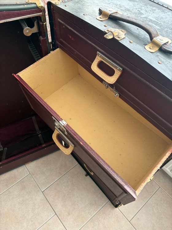 Image 1 of Oshkosh stoombootkoffer uit 1920