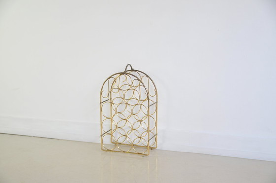 Image 1 of portabottiglie in metallo dorato