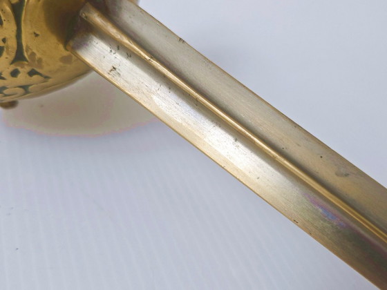 Image 1 of Posacenere vintage anni '70 a forma di spada, in ottone e bronzo dorato.