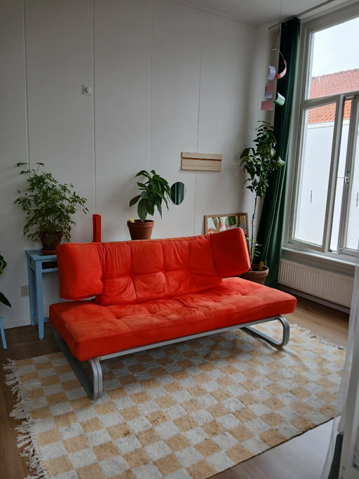 Red suede sofa vintage