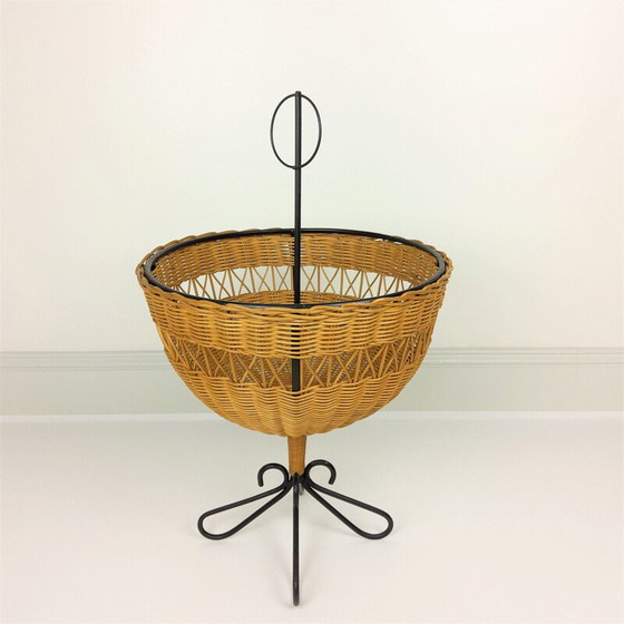 Image 1 of Vintage rattan basket on 4 black lacquered metal legs, 1950